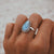 Tropfenförmiger Larimar Ring mit Twist Verzierung - Tropical Tribe